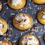 Top each cupcake with a dollop of the filling, and a sprinkle of toasted coconut