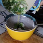 Pour the sauteed onions through a mesh sieve.