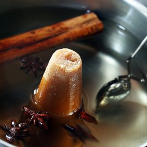 Making the flavor tea with piloncillo, 2 kinds of anise and cinnamon
