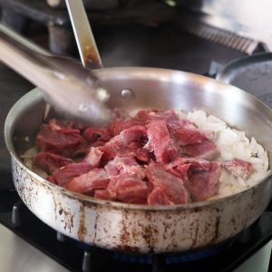 Browning beef cubes for Carne Guisada