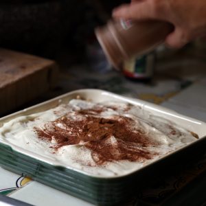 Sprinkle the Arroz con Leche Bars with ground cinnamon for the finishing touch!