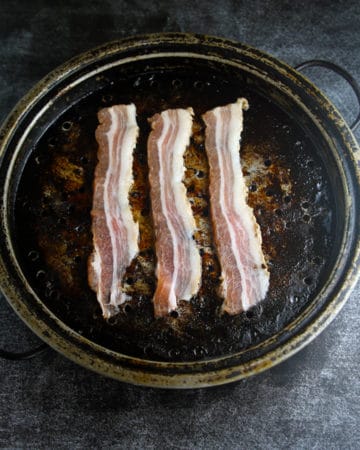 Strips of Home Cured Bacon, ready for the broiler