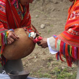 Serving the first bowl of chicha