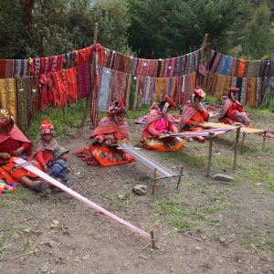 Women weaving at pachamanca