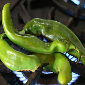Hatch Chiles Roasting on a Flame