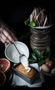 Glazing the Cardamom Spice Pecan Pound Cake with Ruby Red Glaze