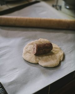 Flat dough and sausage for Czech Style Klobasniki with Jalapeno Sausage
