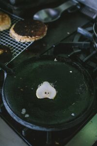 Grilling a pear slice on a griddle