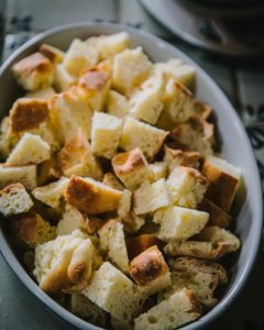 Bread geoes into baking dish