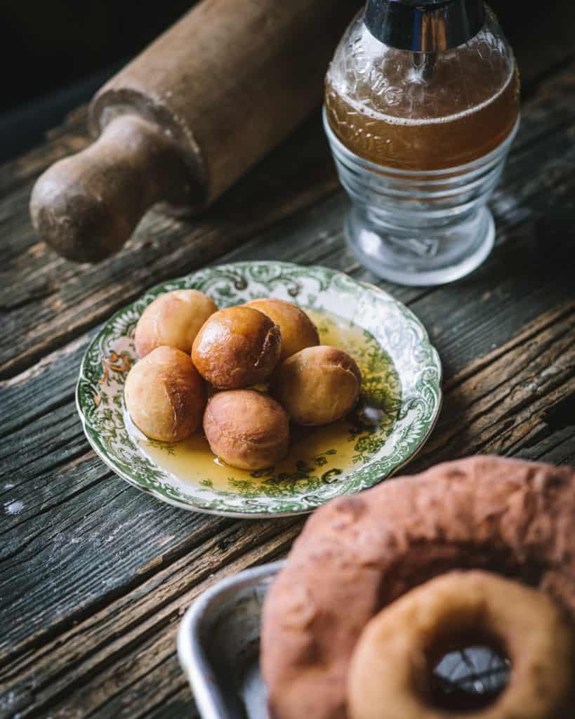 Doughnut holes dipped in honey