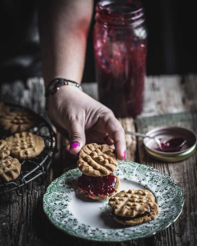 hand making cookies