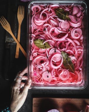 tray of pink pickled onions