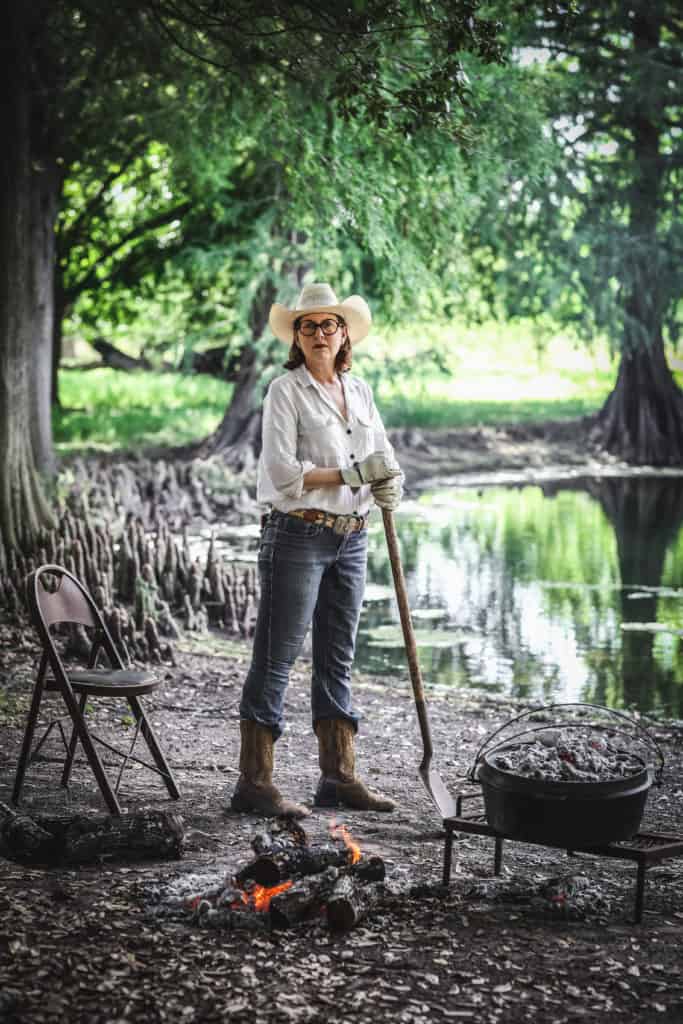 woman with shovel outdoors