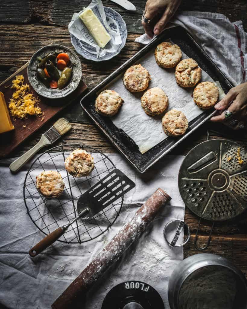 hands with tray of biscuits