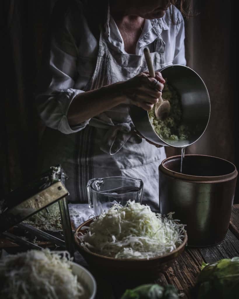 woman pouring liquid