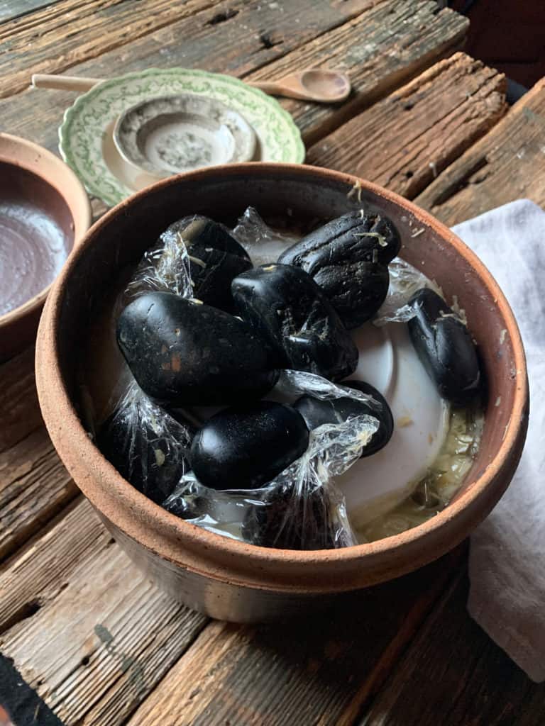 stones on a plate in a crock