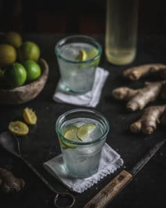 cocktail in glass with limes