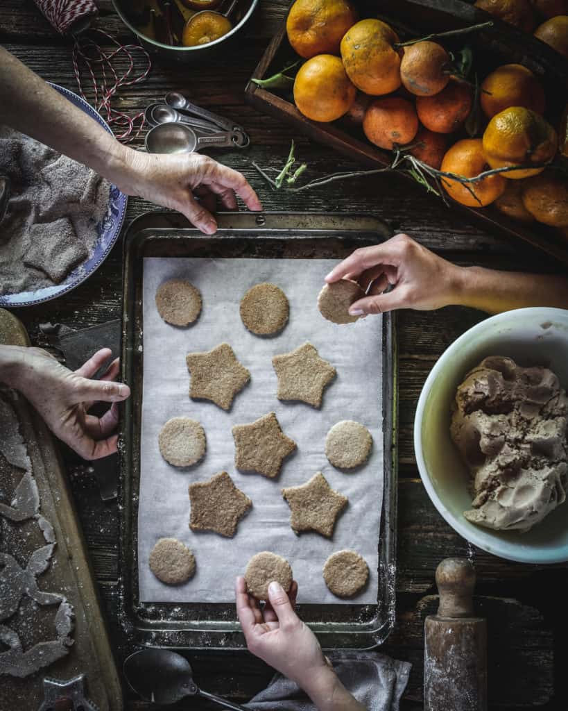hands arranging cookies