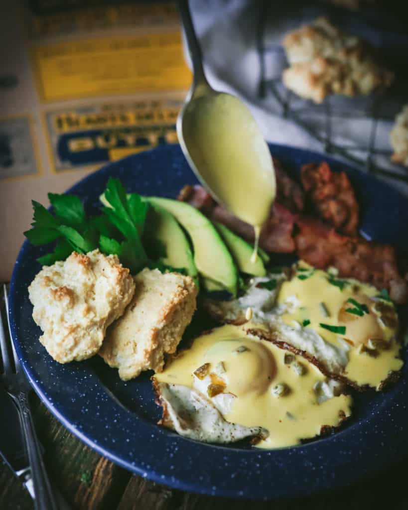 plate with eggs bacon avocado and keto drop biscuits