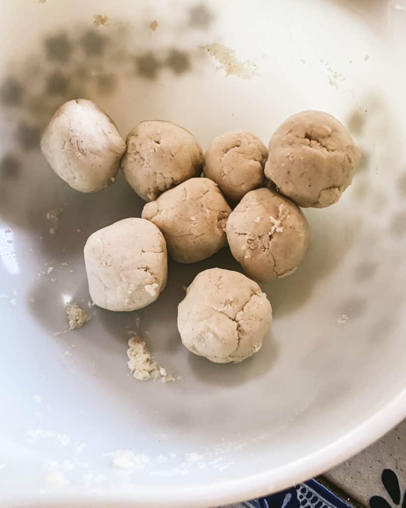 portions of tortilla dough