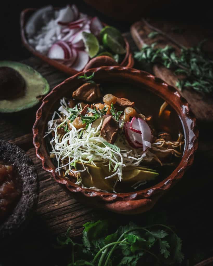 pozole rojo in a bowl