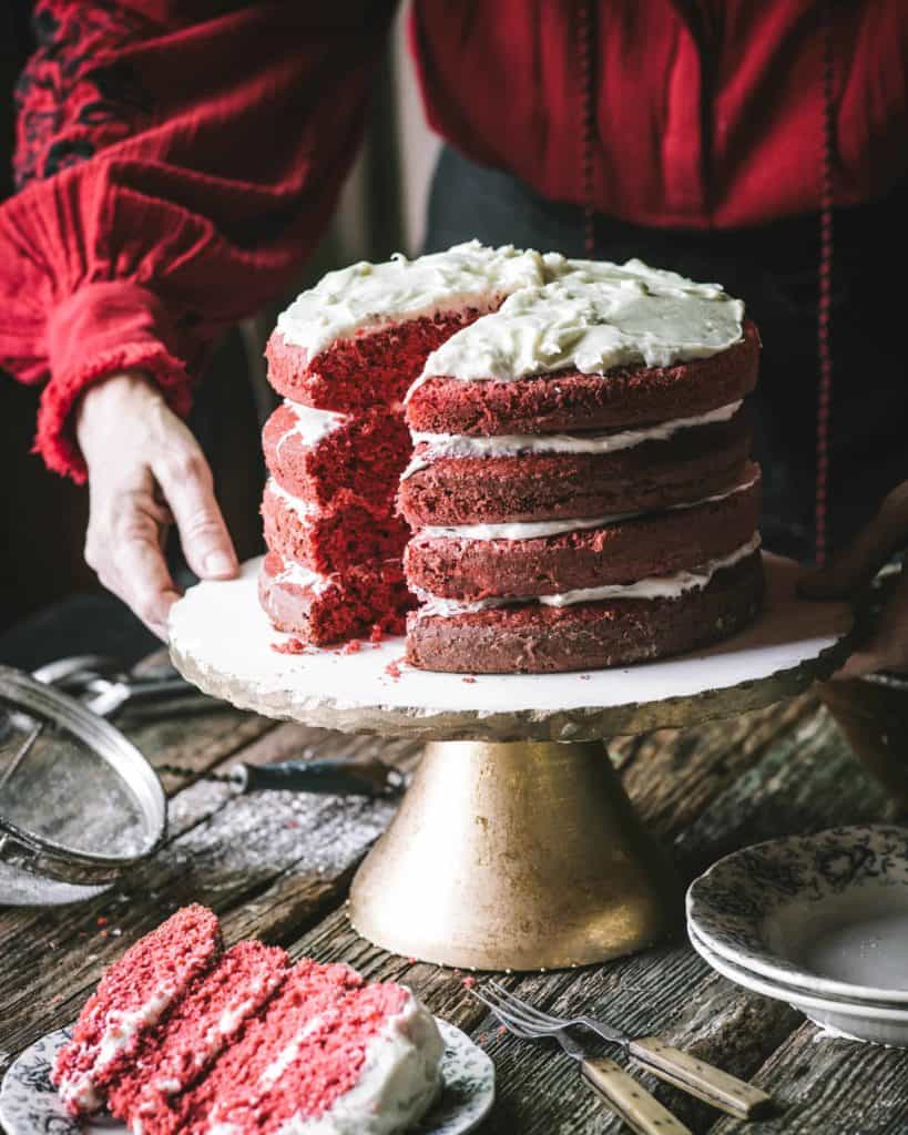 red velvet cake on pedestal