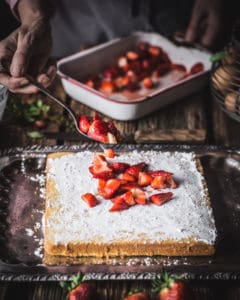 woman making strawberry shortcake