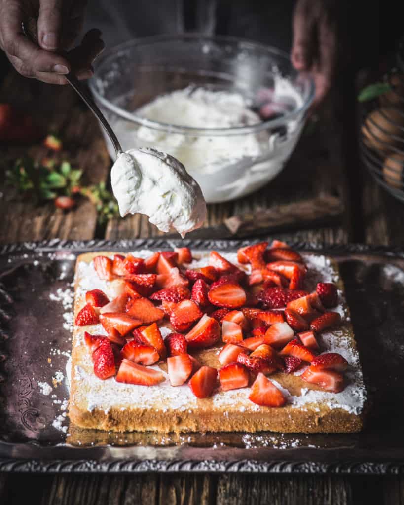 woman making strawberry shortcake