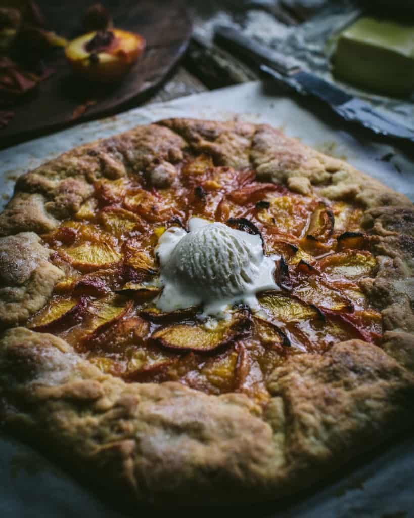 peach galette with melting ice cream