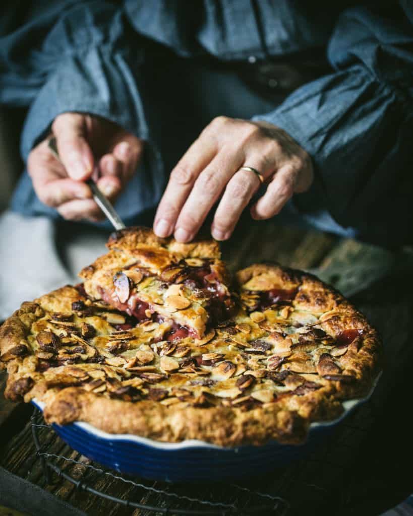 woman slicing pie