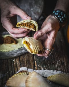 cross section of baked pumpkin empanada