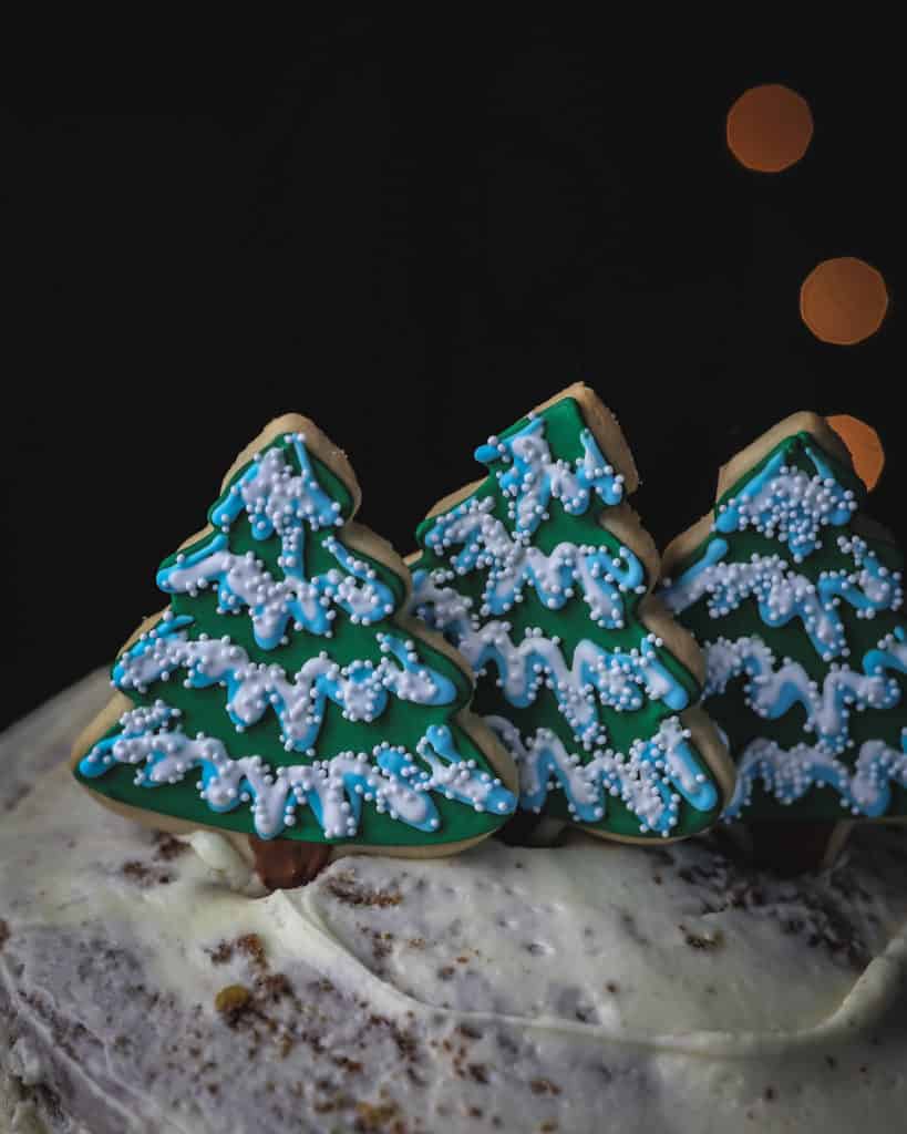 Christmas tree cookies on 24 carrot cake