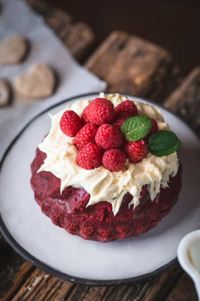 small red cake on platter