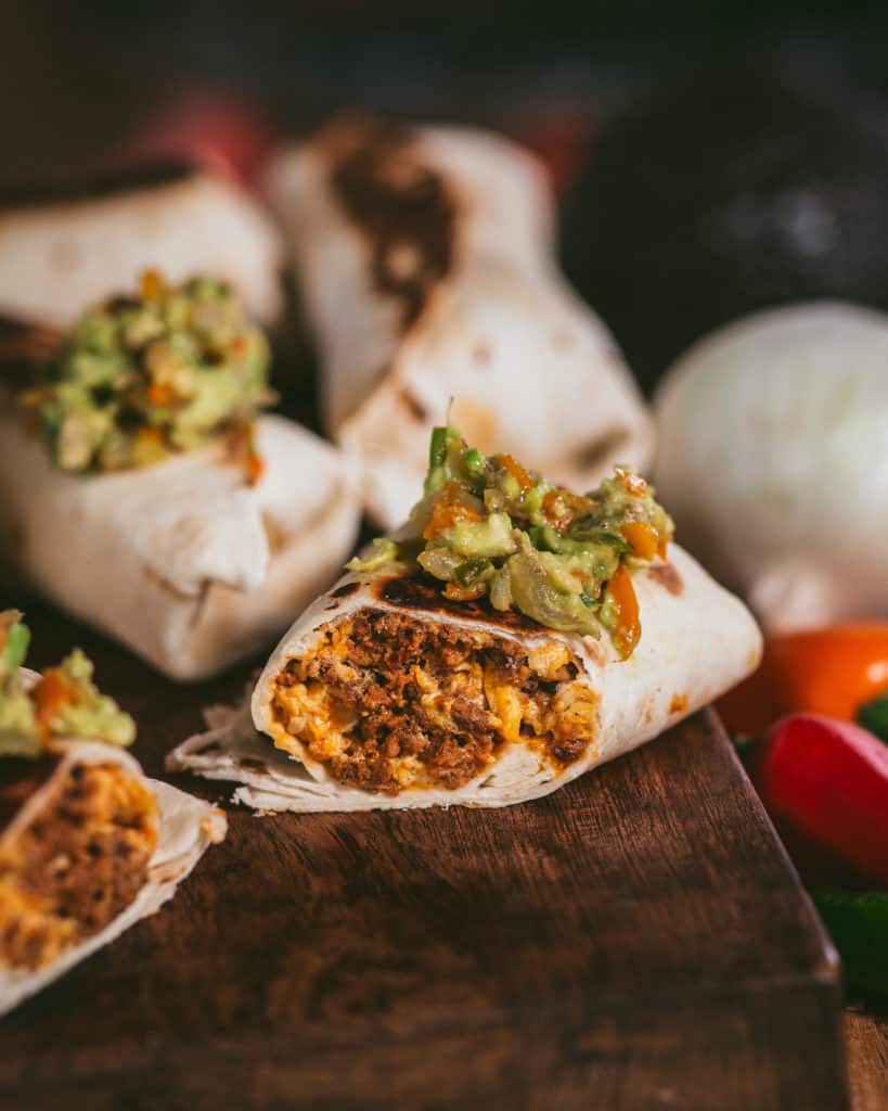 close up of chorizo and egg burritos