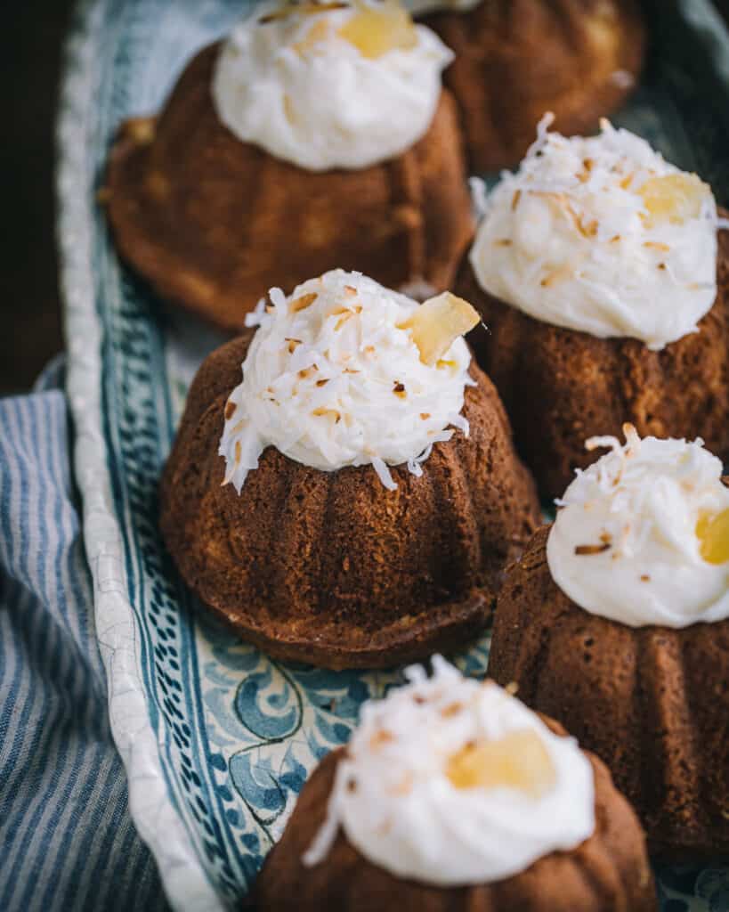 tray of small pina colada cakes