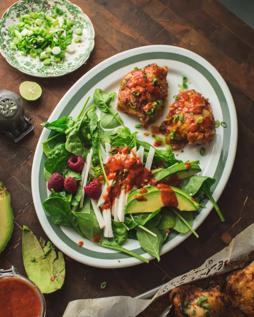 Overhead view of platter of Raspberry Chipotle Chicken with Jicama Salad