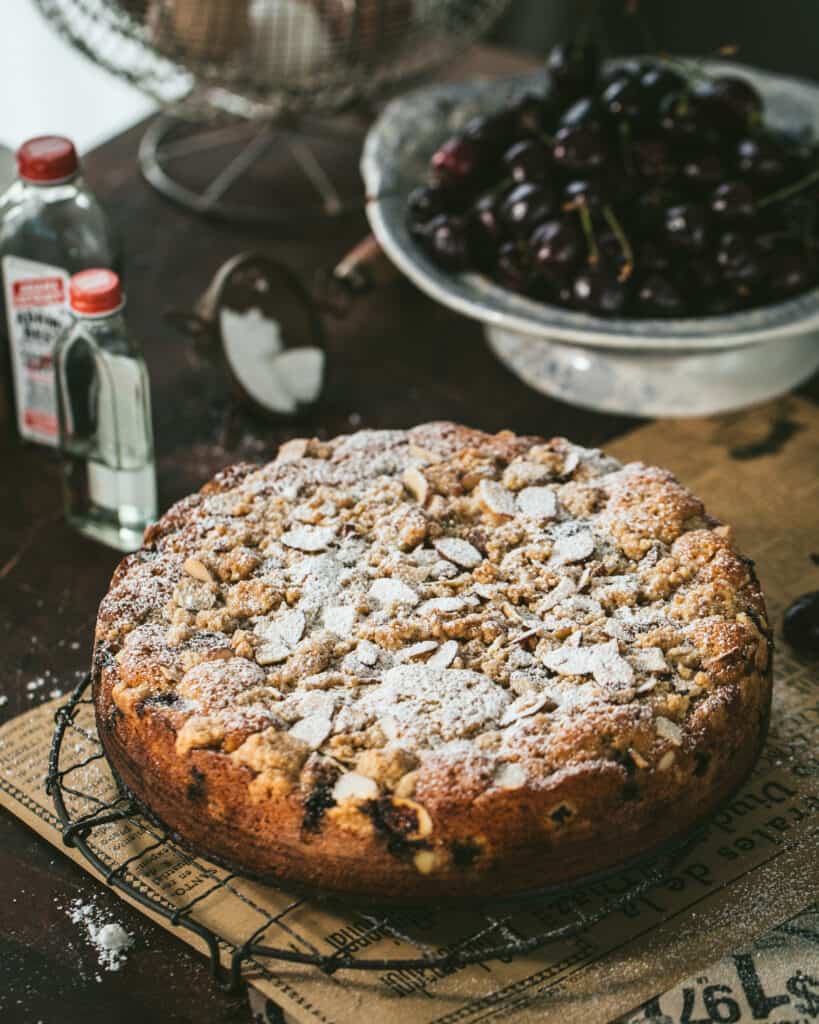 Summer Cherry Crunch Cake on cooling rack