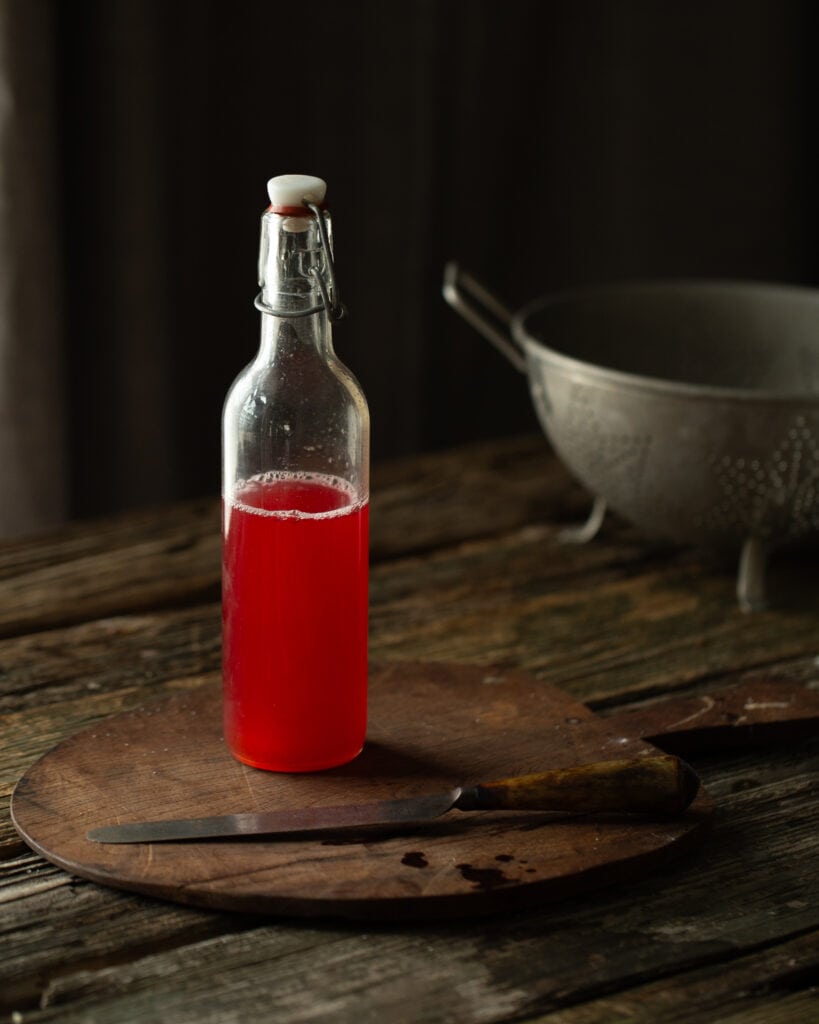 bottle of plum syrup