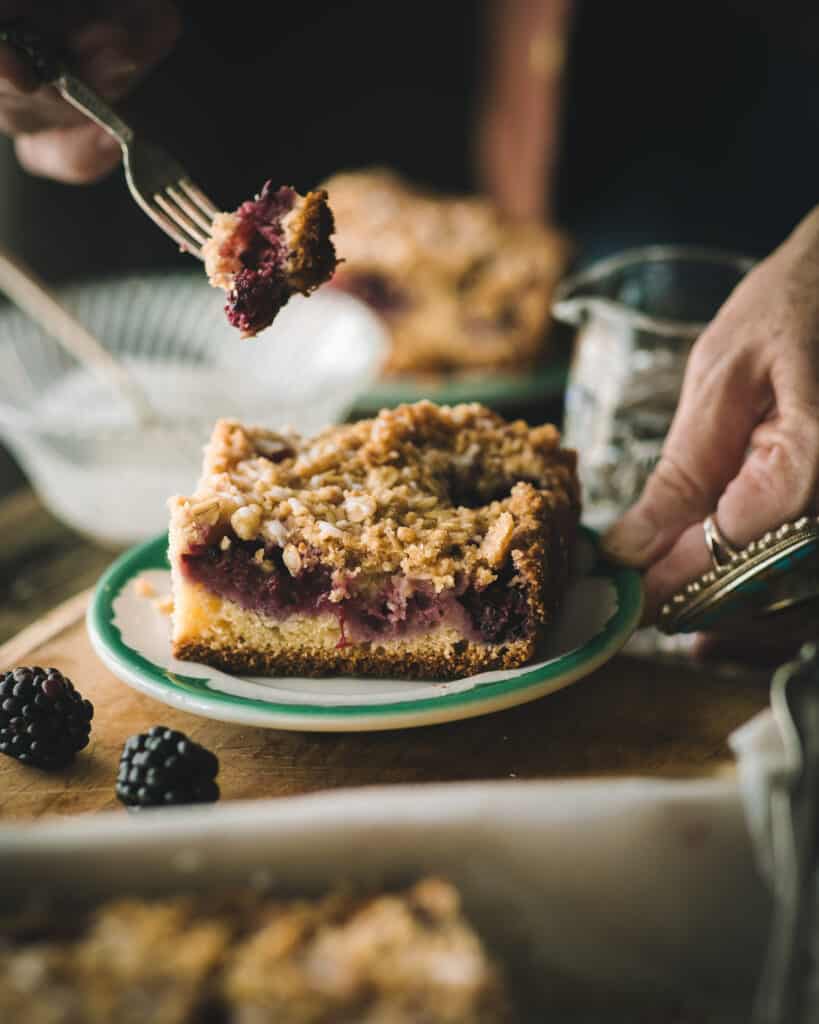 fork with bite of Blackberry Oatcrunch Coffeecake