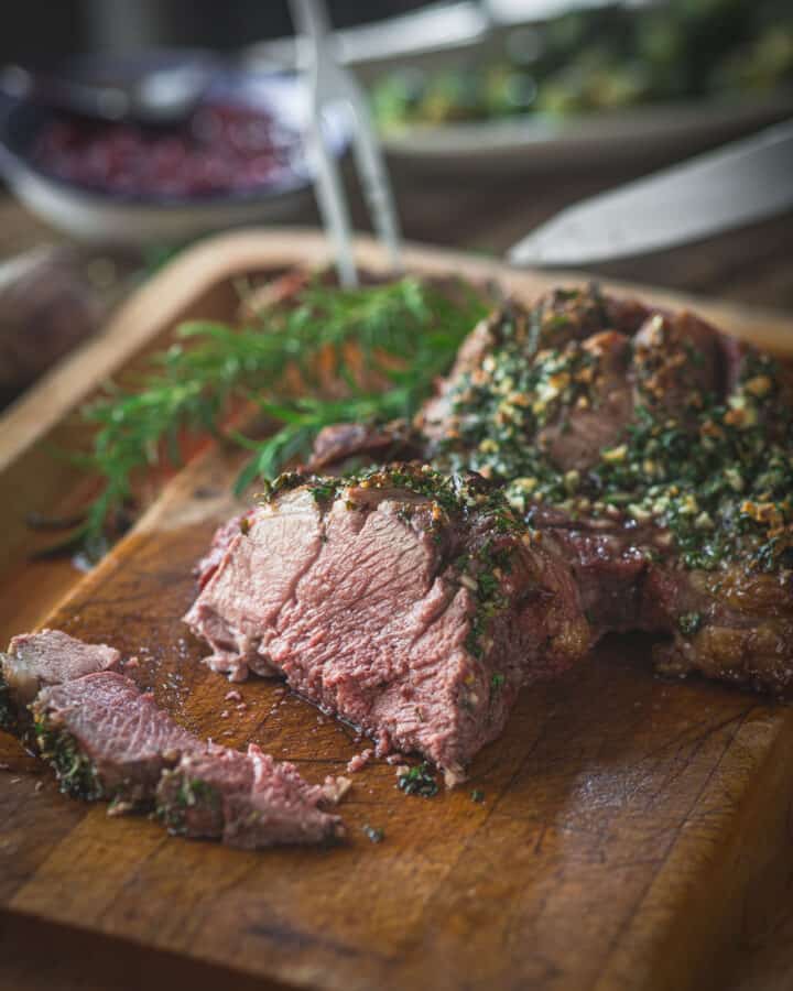 close up of Roasted Leg of Lamb with Brussels Sprouts