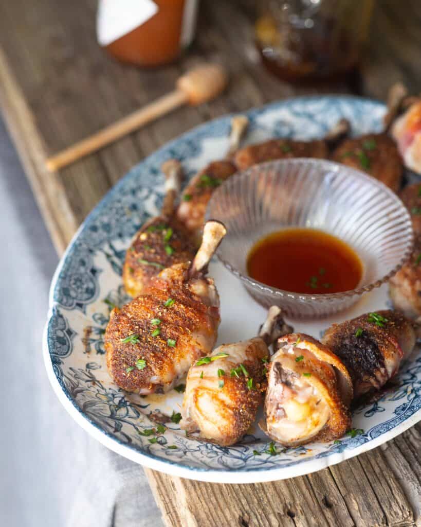 Spicy Chicken Lollipops with Tabasco Honey on a platter