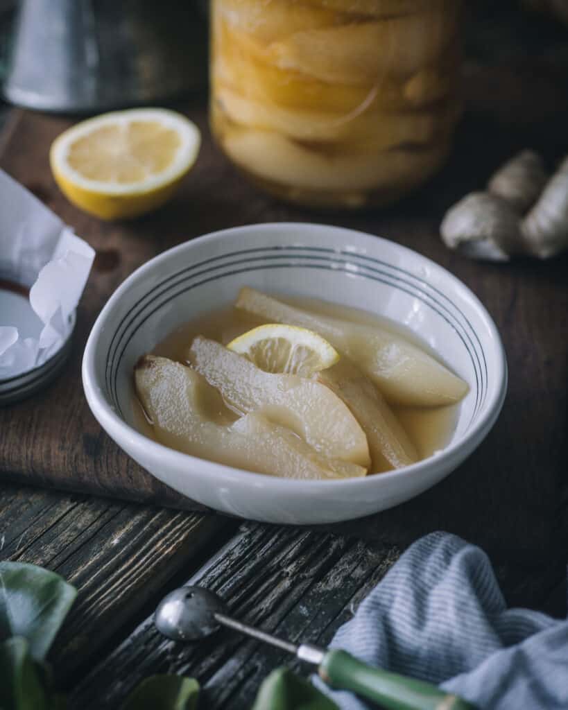 close up detail of bowl of honey ginger pears