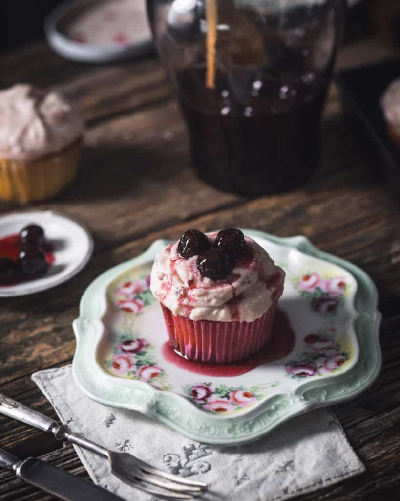 cherry cupcake on a plate