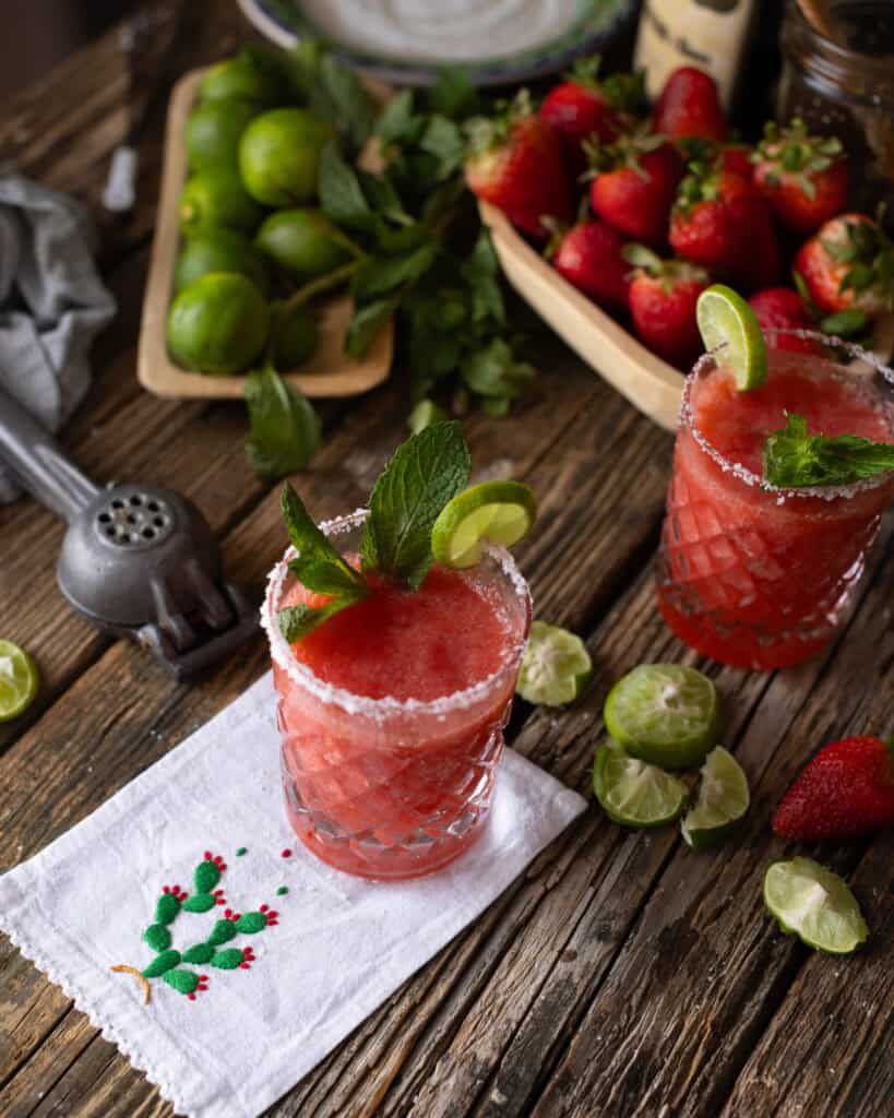 overhead view of strawberry margarita with mint
